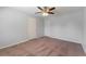 Spacious bedroom with neutral carpeting and two entry doors at 530 Bell Se Rd, Conyers, GA 30094