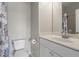 Bathroom featuring a toilet, mirror, vanity and shower with bathtub at 1123 Providence Pl, Decatur, GA 30033