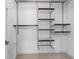 Walk-in closet with shelving and rods for storage at 1123 Providence Pl, Decatur, GA 30033