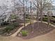 Scenic walking trails through well-maintained community green spaces with flowering trees at 1123 Providence Pl, Decatur, GA 30033