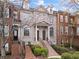 Attractive brick townhomes feature elegant detailing and well-maintained front yards for a welcoming feel at 1123 Providence Pl, Decatur, GA 30033