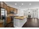 Open kitchen features stainless steel appliances and a butcher block island, perfect for entertaining at 1123 Providence Pl, Decatur, GA 30033