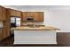Bright kitchen island with butcher block top, stainless steel sink, and shaker style cabinets at 1123 Providence Pl, Decatur, GA 30033