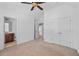 Bright bedroom featuring double closets and an ensuite bathroom, providing convenience and privacy at 2365 Barrington Trace Sw Cir, Atlanta, GA 30331