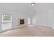 Bright bedroom features a cozy fireplace, providing a warm and inviting atmosphere with natural light at 2365 Barrington Trace Sw Cir, Atlanta, GA 30331