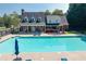 Community pool with lounge chairs and covered area for relaxation and social gatherings at 2365 Barrington Trace Sw Cir, Atlanta, GA 30331