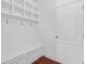 Mud room with shelving, hooks, and bench at 2365 Barrington Trace Sw Cir, Atlanta, GA 30331