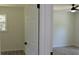 Bright bedroom featuring neutral walls, modern flooring, and a ceiling fan at 3811 Crosby Nw Dr, Atlanta, GA 30331