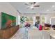 Modern living room features hardwood floors, stylish furniture, and an open layout at 417 Brooch Way, Stockbridge, GA 30281