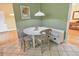 Cozy breakfast nook featuring a round table, chairs, and built-in bench seating at 951 Woodmont Dr, Marietta, GA 30062