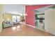 Bright living room featuring hardwood floors and a partial view into the modern kitchen at 951 Woodmont Dr, Marietta, GA 30062