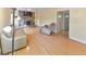 Cozy living room with hardwood floors, stone fireplace, neutral walls, and lots of natural light at 951 Woodmont Dr, Marietta, GA 30062