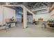 An unfinished basement providing ample space for storage or opportunity to customize as a workshop or hobby area at 18 Crolley Ln, White, GA 30184