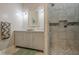 Elegant bathroom features double vanity, marble countertops, modern lighting, and tiled walk-in shower at 18 Crolley Ln, White, GA 30184