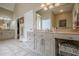 A large primary bathroom with double sinks, vanity, and plenty of storage at 18 Crolley Ln, White, GA 30184