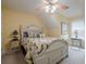 A cozy bedroom features a charming bed frame, overhead fan and natural light at 18 Crolley Ln, White, GA 30184