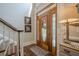 Elegant entryway with hardwood floors, a decorative front door, and beautiful decor at 18 Crolley Ln, White, GA 30184