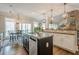 Bright kitchen with island, granite countertops and eat in breakfast nook at 18 Crolley Ln, White, GA 30184