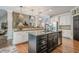 Open concept kitchen, stainless steel appliances and island at 18 Crolley Ln, White, GA 30184