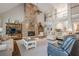 Cozy living room featuring a stone fireplace, hardwood floors, and comfortable seating at 18 Crolley Ln, White, GA 30184