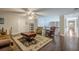Spacious living room with hardwood floors and decorative rug, perfect for entertaining guests at 18 Crolley Ln, White, GA 30184