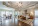 A spacious primary bedroom with tray ceiling, sitting area, and access to the bathroom at 18 Crolley Ln, White, GA 30184