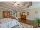 A spacious primary bedroom featuring a tray ceiling, hardwood floors, and ample natural light at 18 Crolley Ln, White, GA 30184