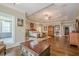 A spacious primary bedroom featuring a tray ceiling, sitting area, and hardwood floors at 18 Crolley Ln, White, GA 30184