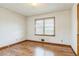 Bedroom with light walls, wood trim, and hardwood floors at 5295 Woodland Dr, Lake City, GA 30260