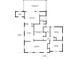 Detailed floor plan showcasing the layout of the home, including bedrooms, kitchen, and living spaces at 5295 Woodland Dr, Lake City, GA 30260