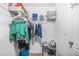 Organized closet with shelving, hanging storage, and shoe rack, providing ample space at 7691 Cabrini Pl, Fairburn, GA 30213