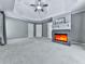 Large bedroom with a fireplace and a tray ceiling is ready for new owners at 907 Fox Croft Pl, Canton, GA 30114
