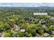 Aerial shot of the Atlanta home, surrounded by trees, and located near I-85 at 998 Ferncliff Ne Rd, Atlanta, GA 30324
