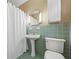 Cozy bathroom with classic fixtures, a shower with a curtain, and clean, well-maintained features at 998 Ferncliff Ne Rd, Atlanta, GA 30324