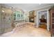 Large bathroom with soaking tub, shower, fireplace, and plenty of room at 998 Ferncliff Ne Rd, Atlanta, GA 30324