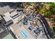 Inviting outdoor fire pit area with Adirondack chairs, picnic table, grill and cornhole game at 998 Ferncliff Ne Rd, Atlanta, GA 30324