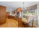 Well-designed kitchen with wood cabinets, stainless appliances, eat-in table, and backyard views at 998 Ferncliff Ne Rd, Atlanta, GA 30324