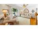 Bright living room with wood floors, furniture, French doors leading to an outdoor patio area, and detailed decor at 998 Ferncliff Ne Rd, Atlanta, GA 30324