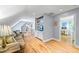 A spacious living room features hardwood floors, recessed lighting, and an entertainment center with built-in cabinets at 998 Ferncliff Ne Rd, Atlanta, GA 30324