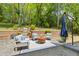 Outdoor patio and kitchen area, perfect for entertaining and enjoying the outdoor living space at 998 Ferncliff Ne Rd, Atlanta, GA 30324