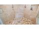 Custom walk-in shower with dual shower heads, bench, and tiled surround at 998 Ferncliff Ne Rd, Atlanta, GA 30324