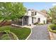 Exterior view of home with screened porch, manicured lawn, landscaping, and gravel pathway at 224 Kings Hwy, Decatur, GA 30030
