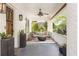 Relaxing front porch features comfortable seating, decorative plants, and stylish lighting fixtures at 224 Kings Hwy, Decatur, GA 30030