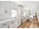 Bright kitchen featuring white cabinets, quartz countertops, stainless steel appliances, and breakfast nook at 224 Kings Hwy, Decatur, GA 30030
