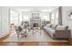 Inviting living room with hardwood floors, neutral decor, and a classic fireplace at 224 Kings Hwy, Decatur, GA 30030