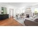 Cozy living room featuring hardwood floors, stylish furniture, and a fireplace at 224 Kings Hwy, Decatur, GA 30030