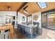 Inviting screened-in patio with a fireplace, comfortable seating, and dining area at 224 Kings Hwy, Decatur, GA 30030