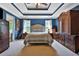 Spacious main bedroom with tray ceiling, carpeted floor, and plenty of natural light at 2675 Dacula Ridge Dr, Dacula, GA 30019