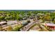 Expansive aerial shot of the town center, highlighting the commercial district, railways, and green spaces nearby at 754 Pinehill Se Dr, Smyrna, GA 30080