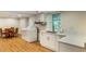 Basement kitchenette with a sink, white countertops, and a washer and dryer at 754 Pinehill Se Dr, Smyrna, GA 30080